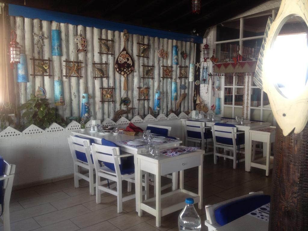 Alp Otel Restaurant Küçükkuyu Exterior foto